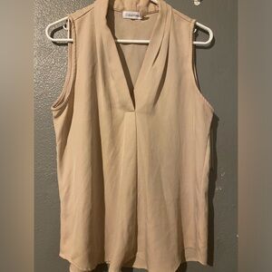 Khaki Calvin Klein outfit. Leopard print romper, and more.